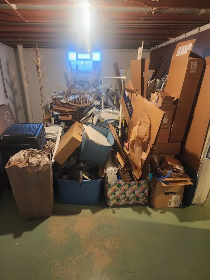 Roll-off dumpster container at job site for 15 Yard Dumpster Rental in Cornelia